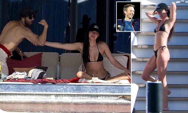 Dakota Johnson Sparks Rumors with Flirty Exchange on Ibiza Yacht After Chris Martin Split