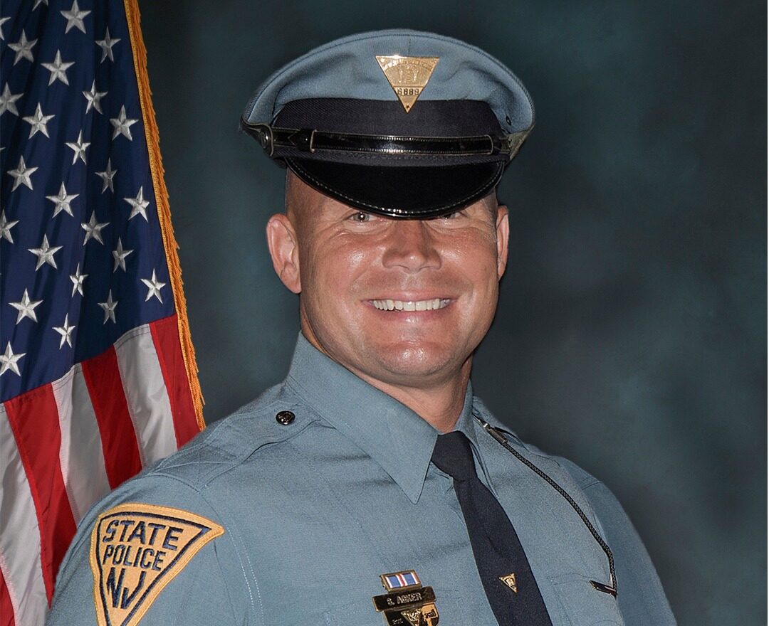 TRENTON, New Jersey — The New Jersey State Police and communities across the state are mourning the loss of Sergeant Sean Acker, who died following complications from a work-related injury, the department confirmed today. His passing marks a profound loss for law enforcement, public service, and all those whose lives he touched throughout his career.
